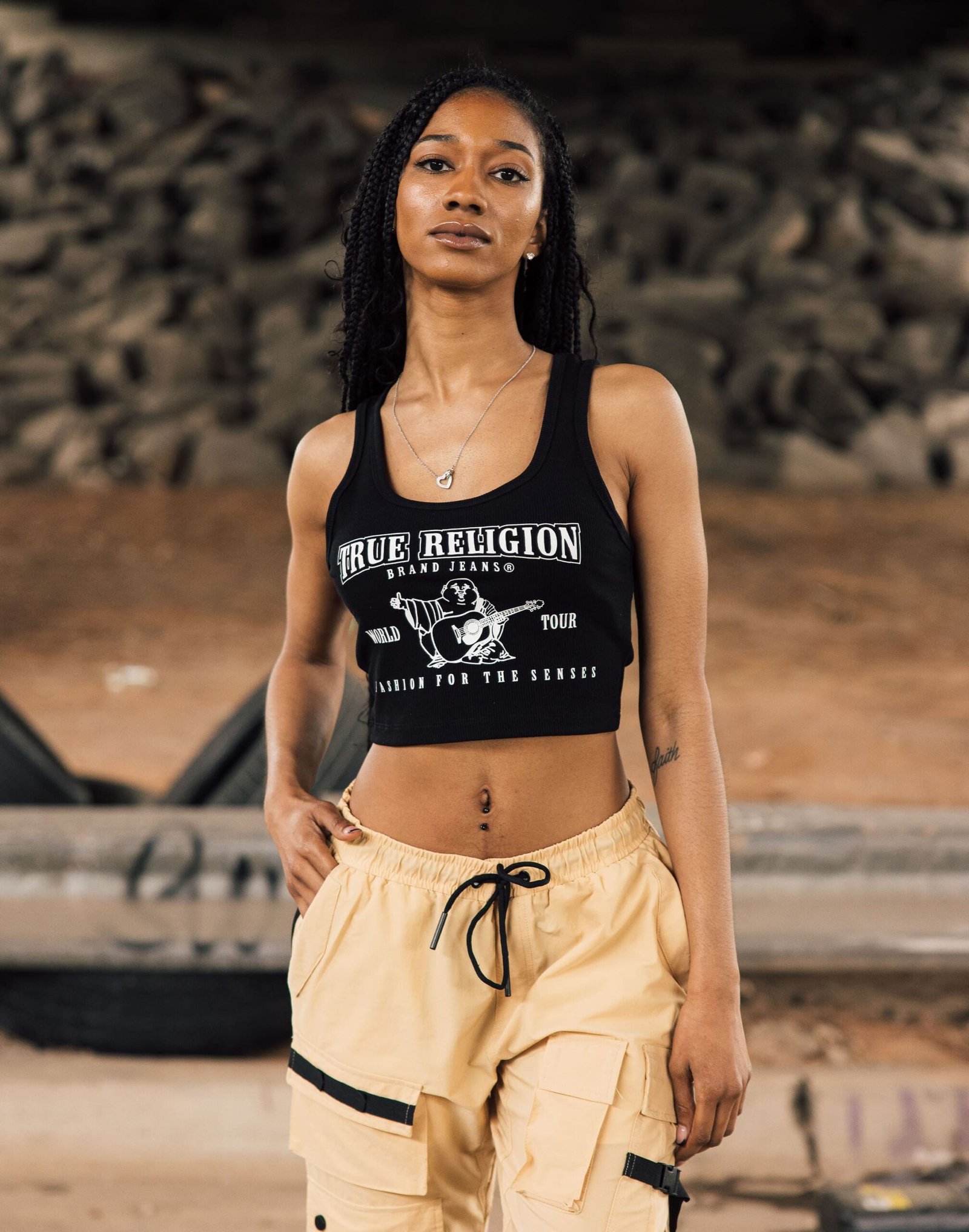 205863-1001-lifestyle True Religion SRS Logo Crop Tank Top - Image 1