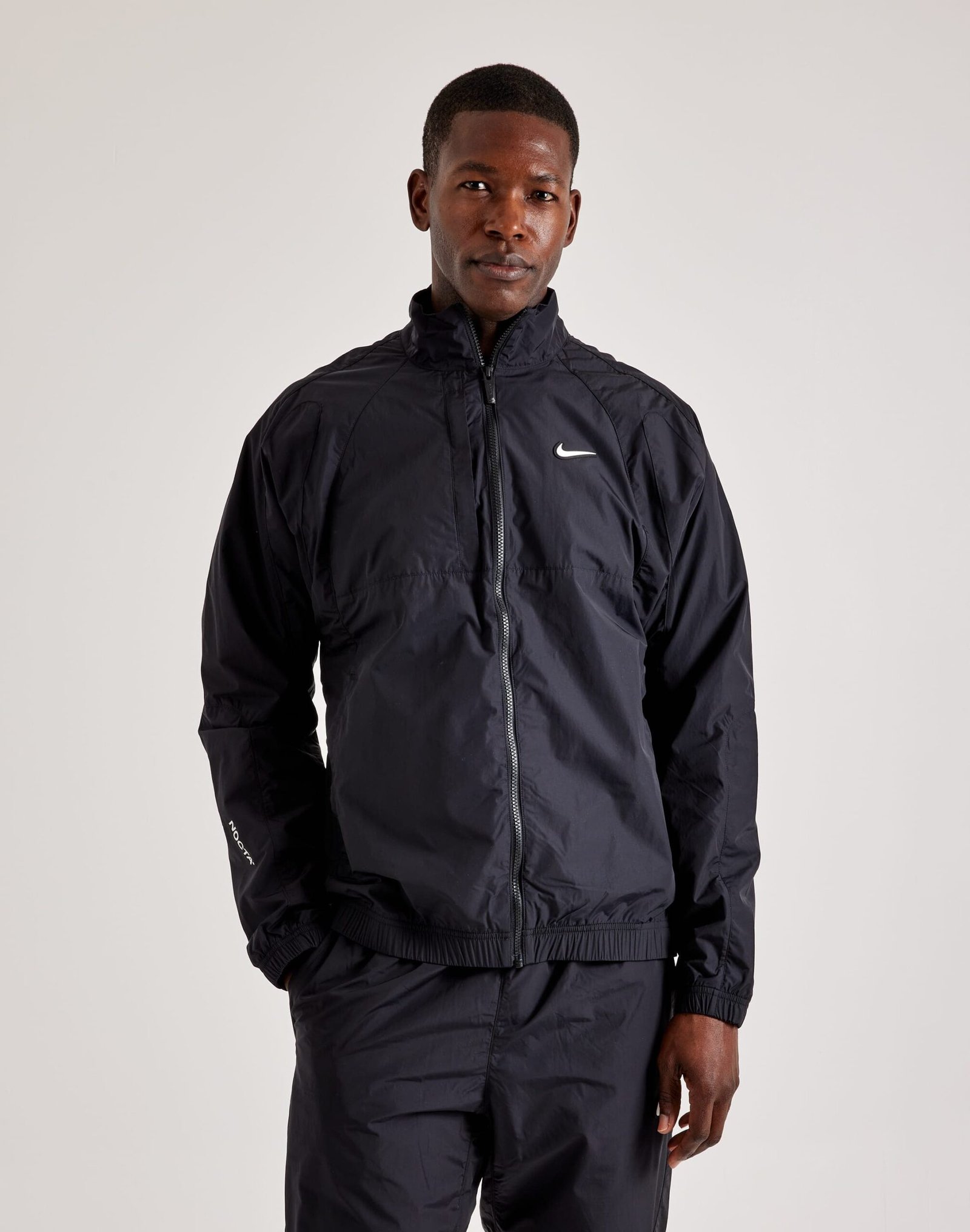 Nike_FN7666-010_M-016 Nike NOCTA Woven Track Jacket - Image 1